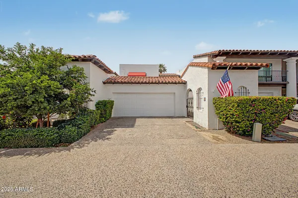 a view of a house with a garage and a garage