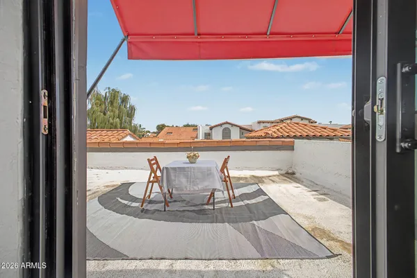 front view of a house with a balcony