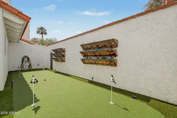 a view of a lake with a yard