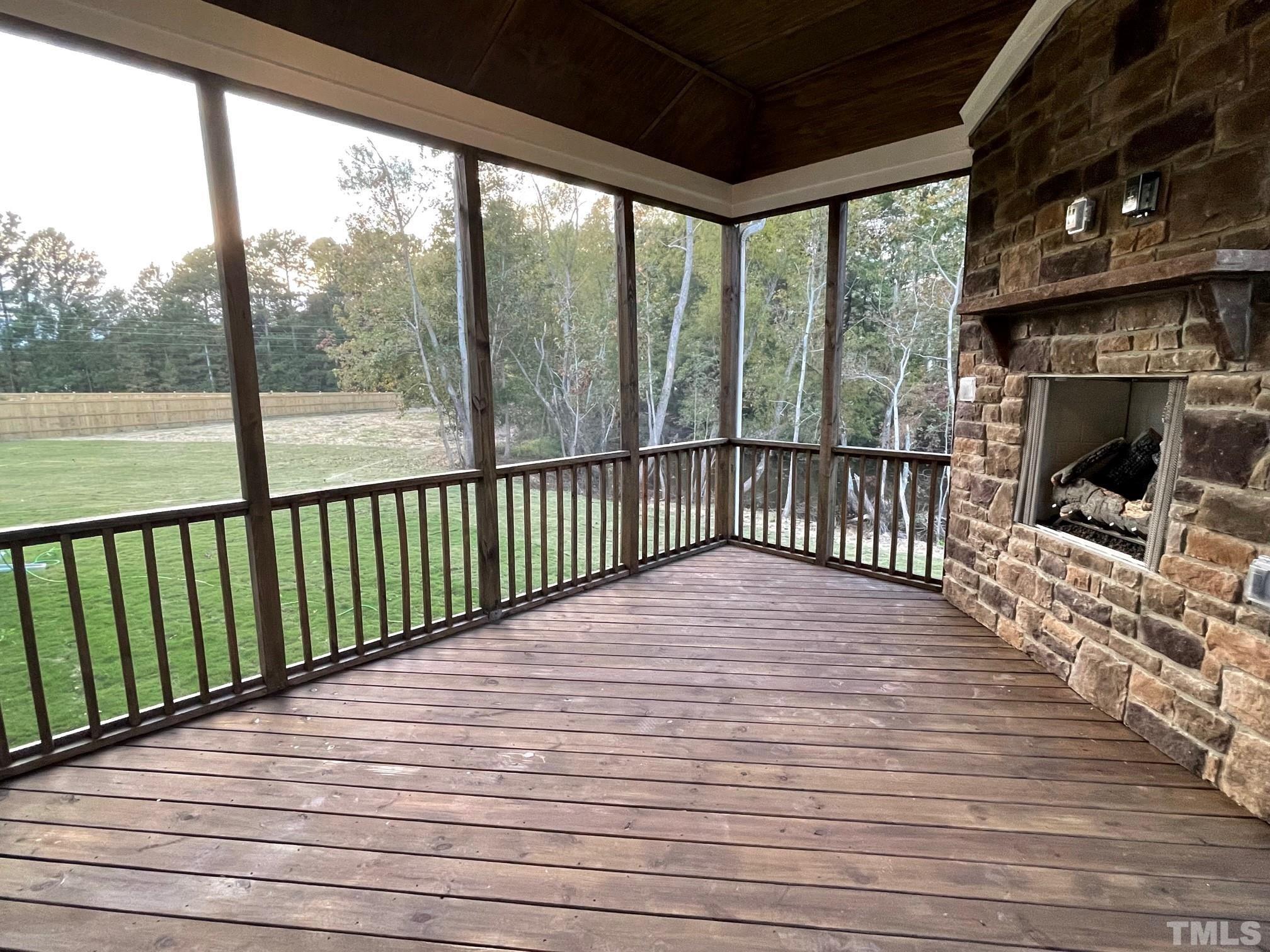 2017 Big Panther Drive Willow Spring, NC 27592 - Photo 15 of 35 a view of a balcony with wooden floor