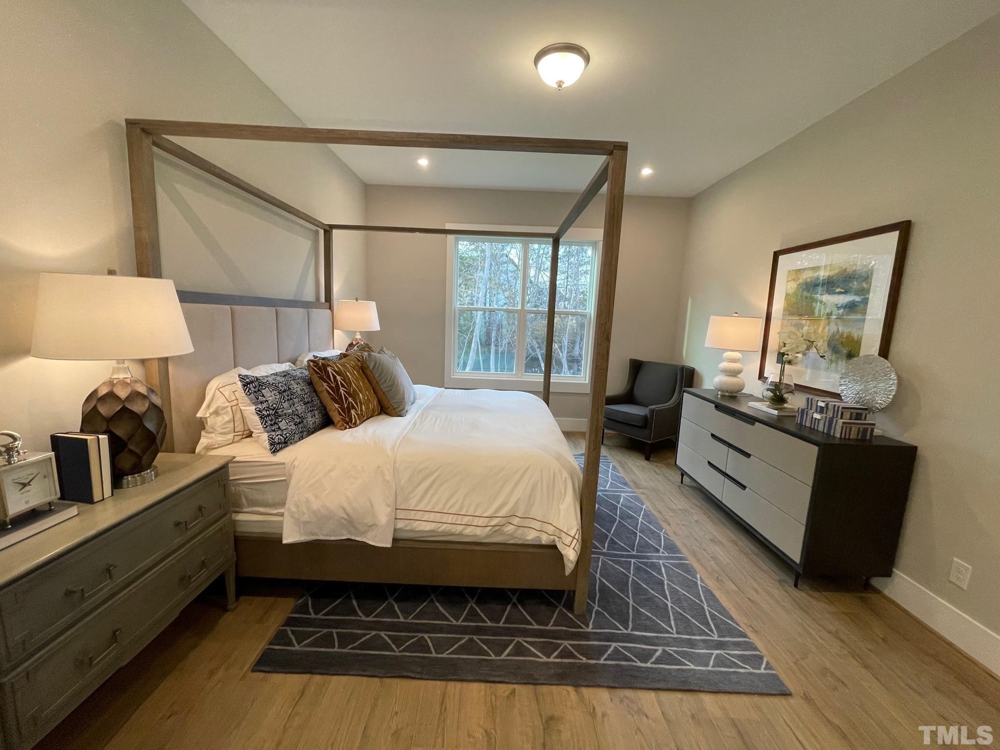 2017 Big Panther Drive Willow Spring, NC 27592 - Photo 18 of 35 a bed room with a bed and a couch