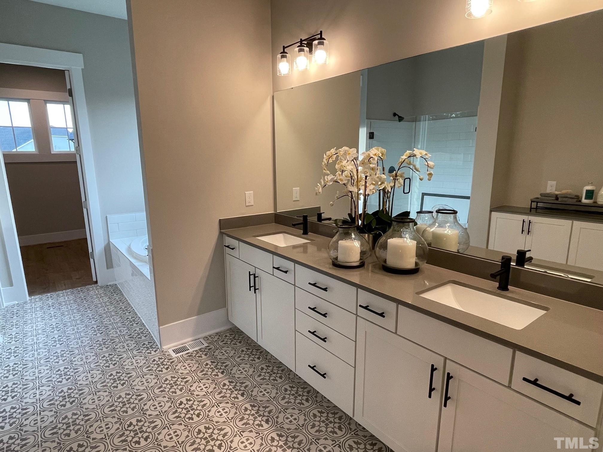 2017 Big Panther Drive Willow Spring, NC 27592 - Photo 20 of 35 a bath room with sink and mirror