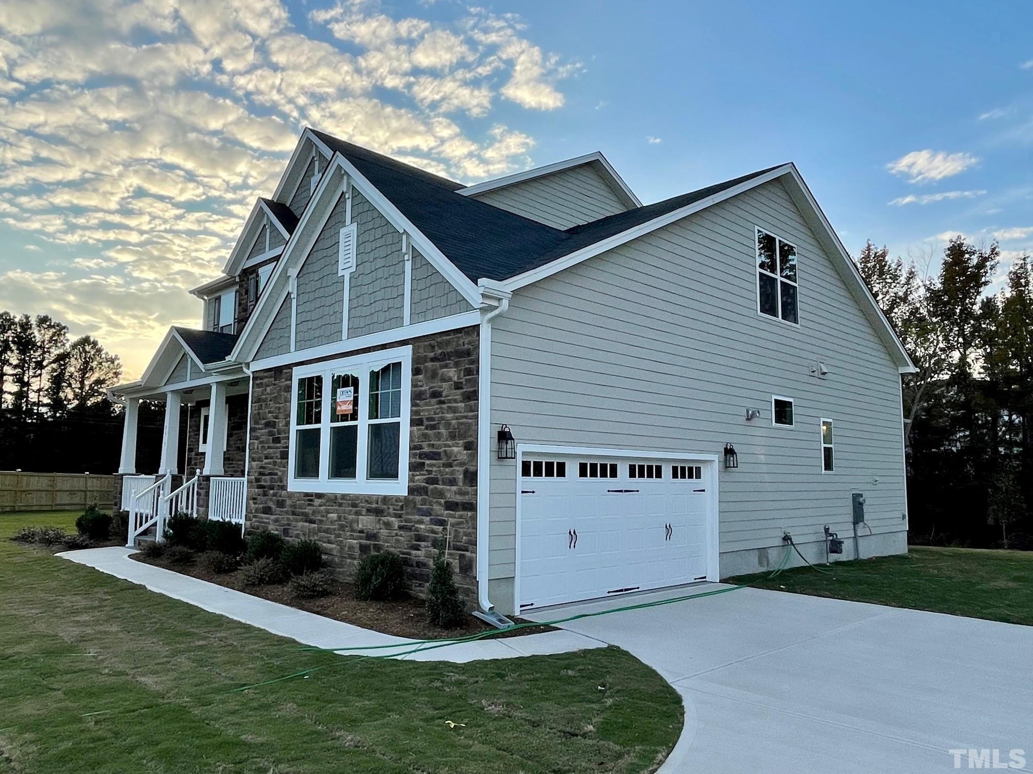 2017 Big Panther Drive Willow Spring, NC 27592 - Photo 2 of 35 a view of house with yard and green space