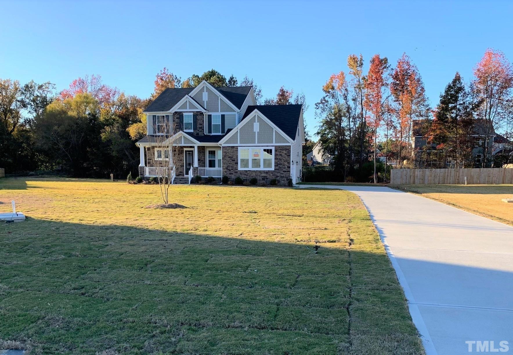 2017 Big Panther Drive Willow Spring, NC 27592 - Photo 3 of 35 a view of a house with a swimming pool
