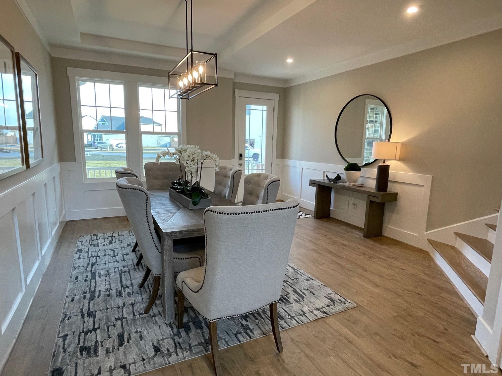 2017 Big Panther Drive Willow Spring, NC 27592 - Photo 6 of 35 a view of a dining room with furniture window and wooden floor