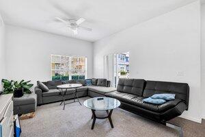 4563 Yellowgold Road East, Unit 107 Kissimmee, FL 34746 - Photo 3 of 22 Living room 01