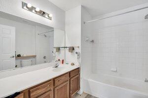 4563 Yellowgold Road East, Unit 107 Kissimmee, FL 34746 - Photo 8 of 22 primary bath