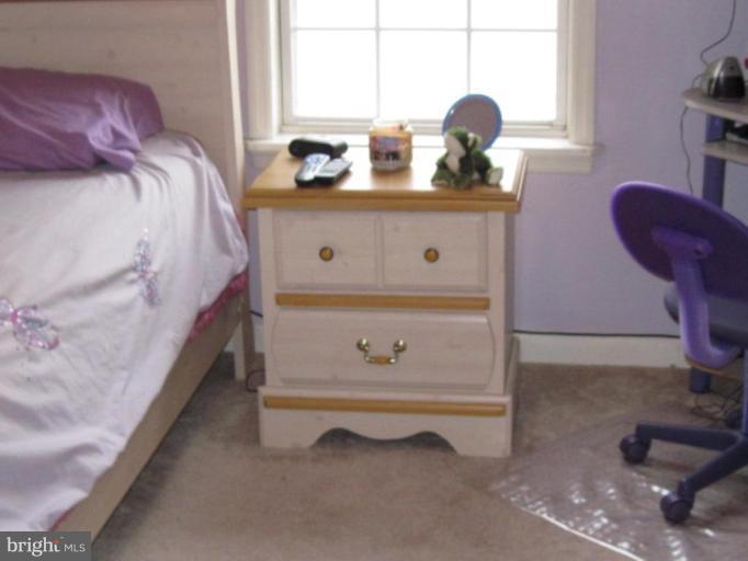 1918 Perryman Road Aberdeen, MD 21001 - Photo 15 of 25 a bedroom with a bed and a window