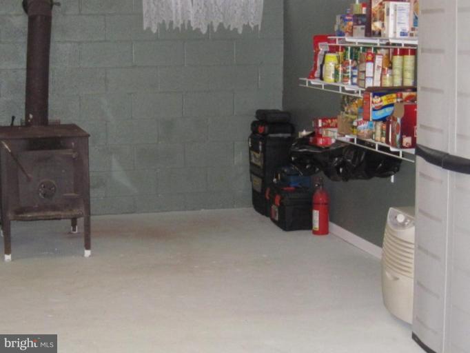 1918 Perryman Road Aberdeen, MD 21001 - Photo 22 of 25 a room with storage and utility