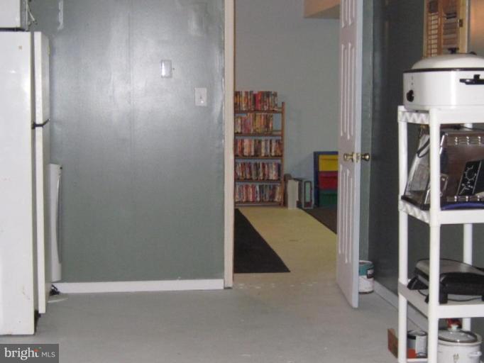 1918 Perryman Road Aberdeen, MD 21001 - Photo 23 of 25 a view of an empty room with shelves