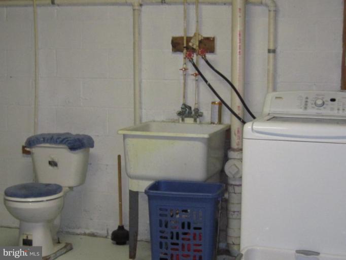 1918 Perryman Road Aberdeen, MD 21001 - Photo 24 of 25 a bathroom with a toilet and a sink