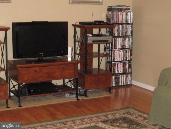 1918 Perryman Road Aberdeen, MD 21001 - Photo 5 of 25 a living room with furniture and a flat screen tv