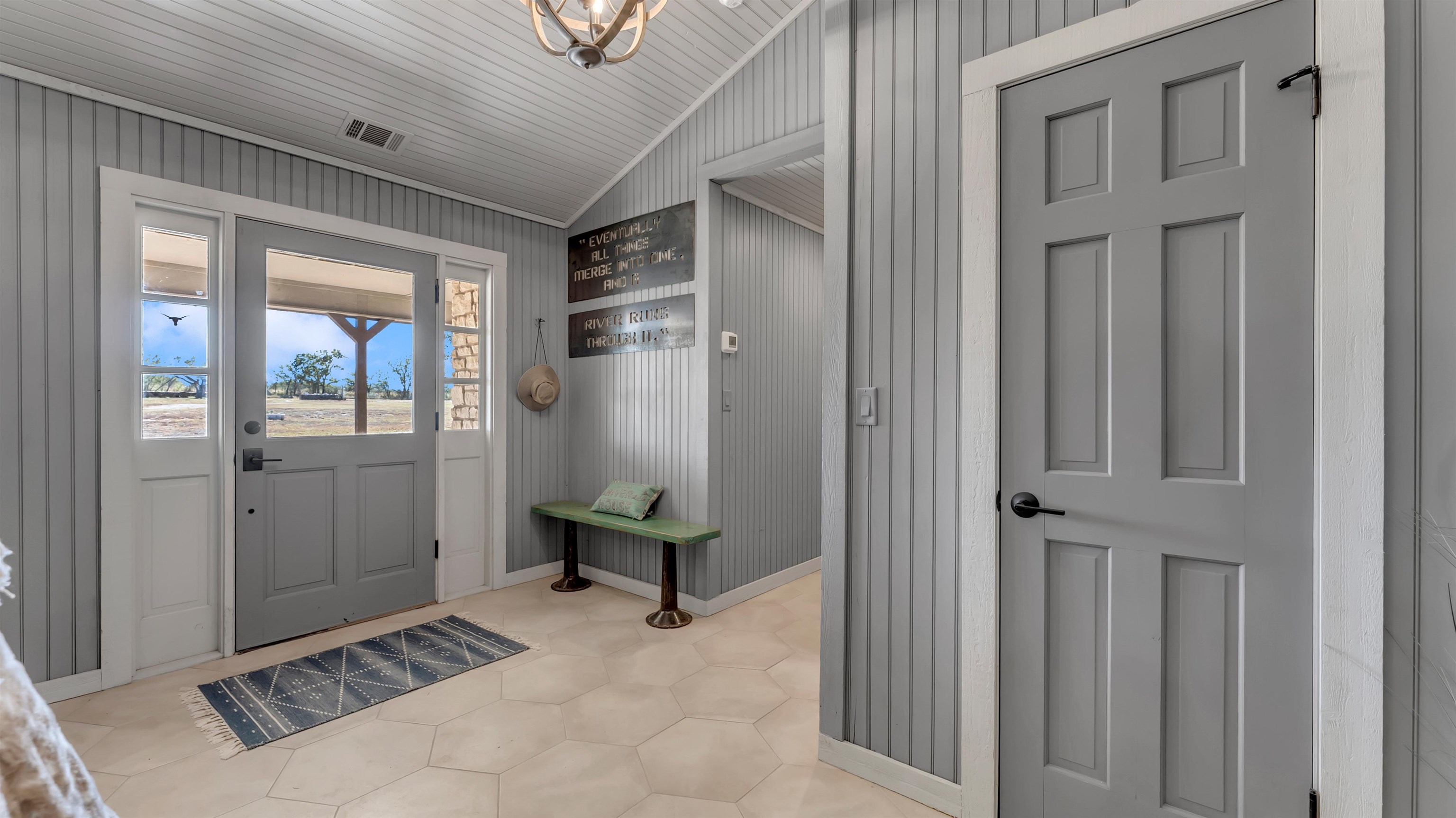 261 Diamond Cross Drive Llano, TX 78643 - Photo 14 of 30 a view of a livingroom with wooden floor and a hallway