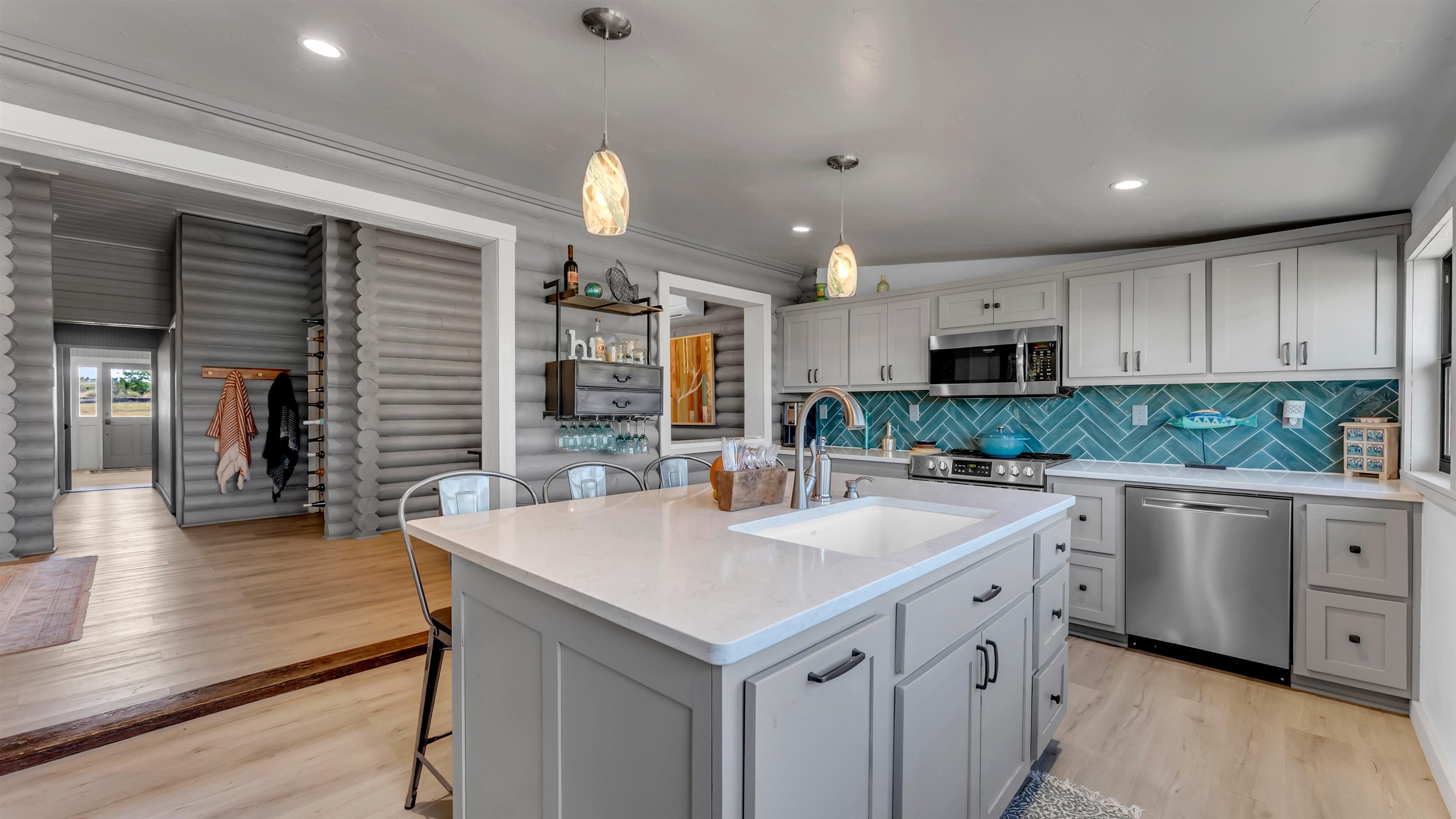 261 Diamond Cross Drive Llano, TX 78643 - Photo 25 of 30 a kitchen with a sink a stove and cabinets