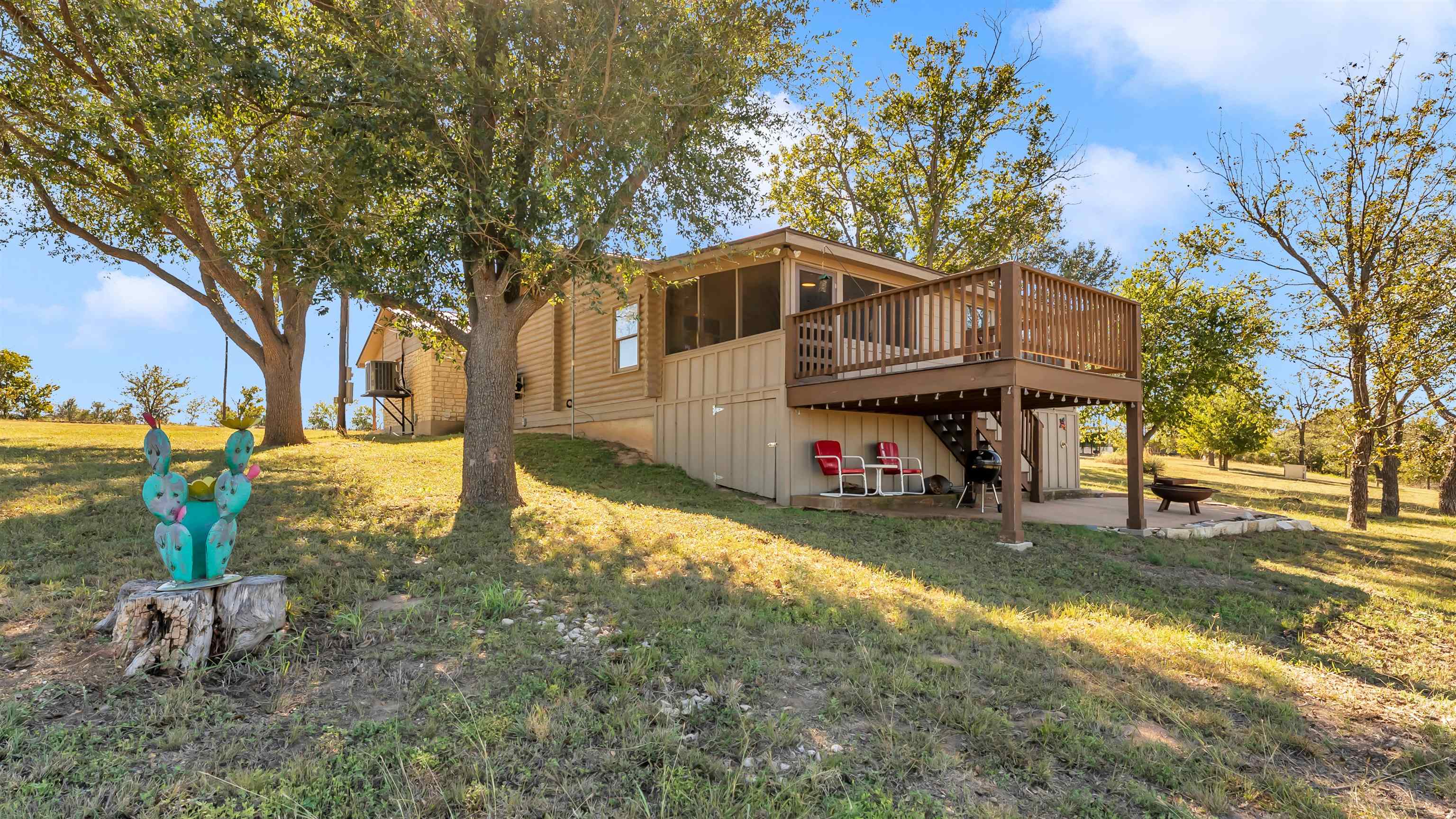 261 Diamond Cross Drive Llano, TX 78643 - Photo 7 of 30 a view of a outdoor space with a tree