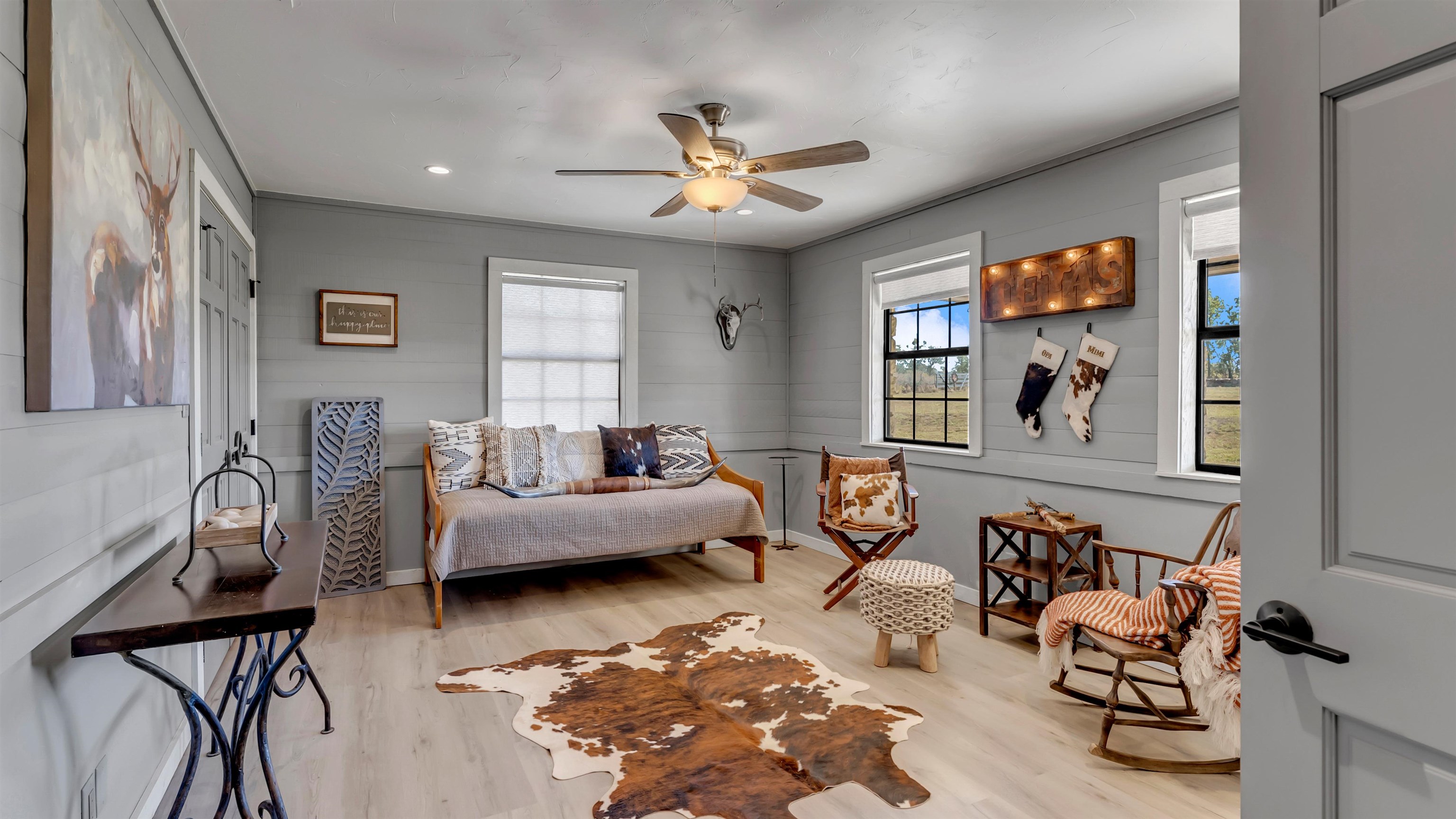 261 Diamond Cross Drive Llano, TX 78643 - Photo 10 of 30 a living room with furniture and a chandelier