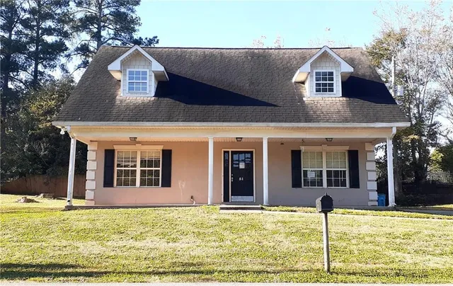 a house view with a outdoor space