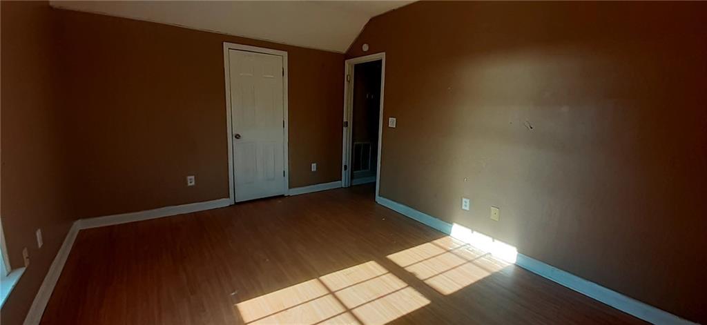 51 Pine Avenue Commerce, GA 30529 - Photo 16 of 24 an empty room with an empty space