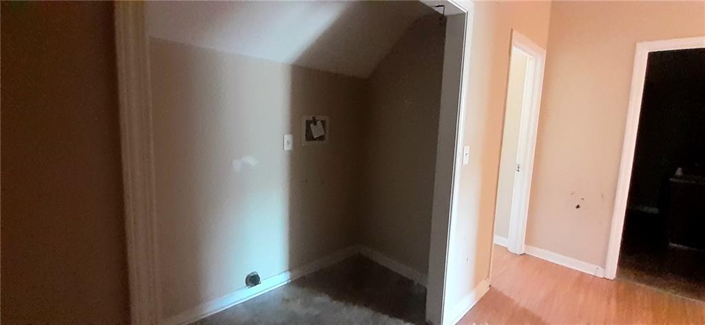 51 Pine Avenue Commerce, GA 30529 - Photo 20 of 24 a view of an empty room and wooden floor