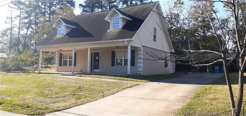 51 Pine Avenue Commerce, GA 30529 - Photo 24 of 24 a view of a house with a yard