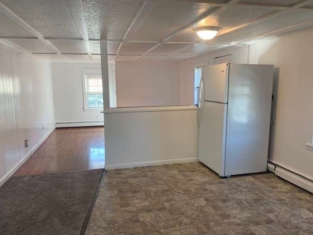 18 Taunton Street, Unit 2 Plainville, MA 02762 - Photo 5 of 15 a view of a refrigerator in a kitchen
