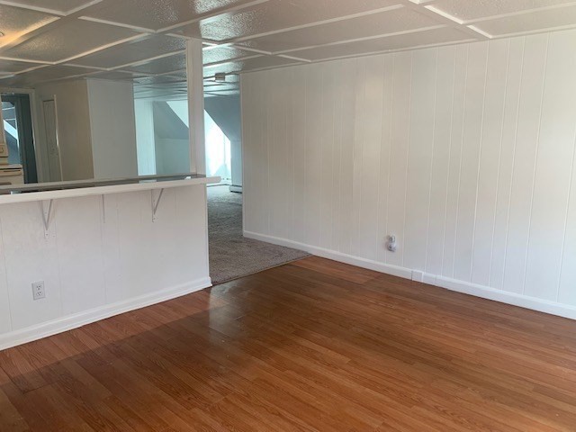 18 Taunton Street, Unit 2 Plainville, MA 02762 - Photo 7 of 15 an empty room with wooden floor and windows