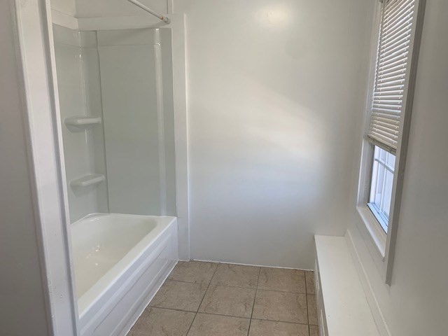 18 Taunton Street, Unit 2 Plainville, MA 02762 - Photo 10 of 15 a bathroom with a bathtub
