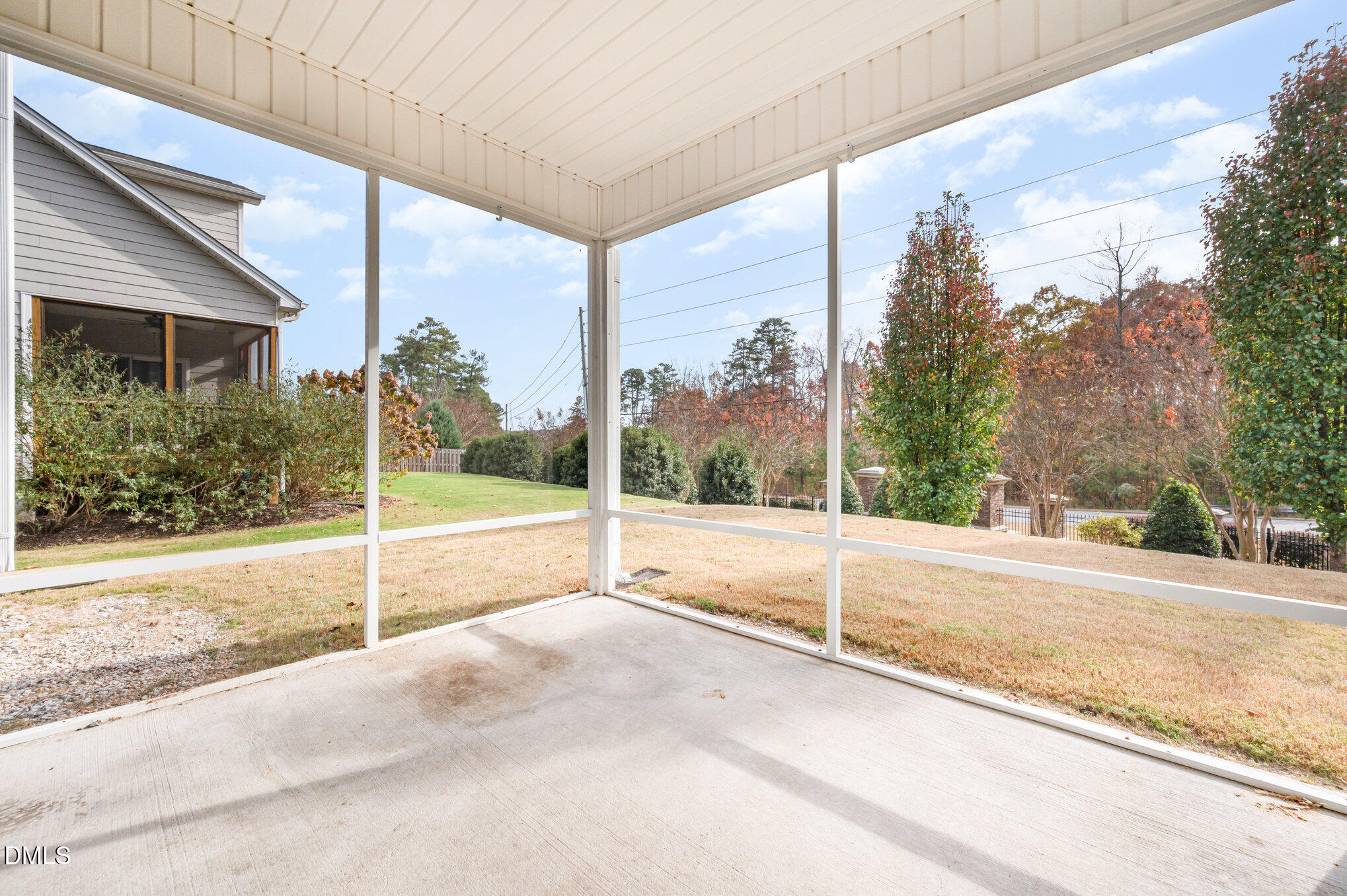 18 Dover Ridge Court Chapel Hill, NC 27517 - Photo 19 of 40 a view of a house with a floor to ceiling window and tree
