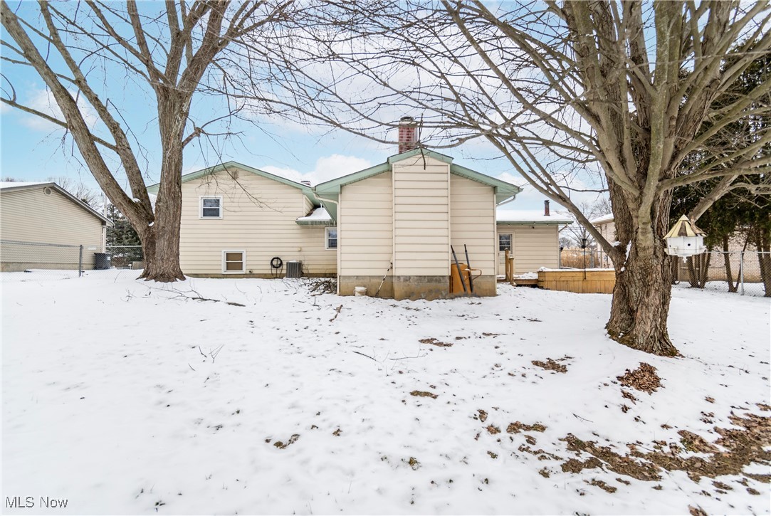 4875 New Road Youngstown, OH 44515 - Photo 4 of 25 Snow covered property featuring central AC
