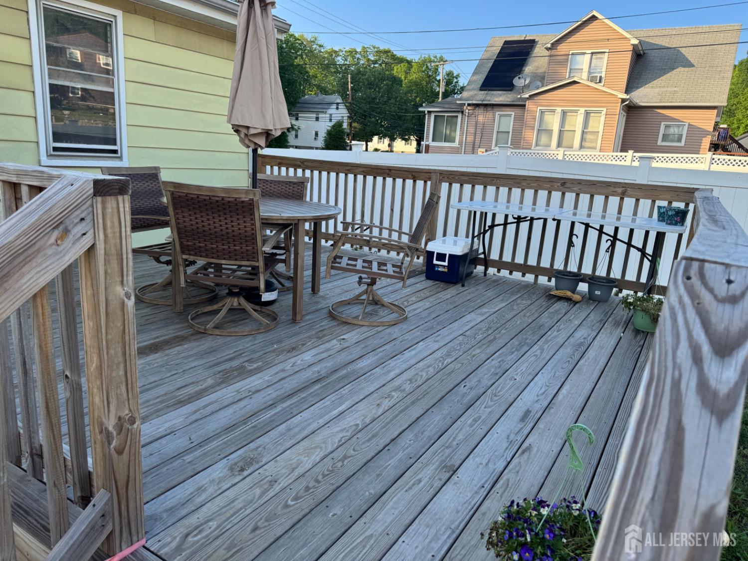 3350 Washington Road Parlin, NJ 08859 - Photo 4 of 18 a view of a wooden chairs on deck
