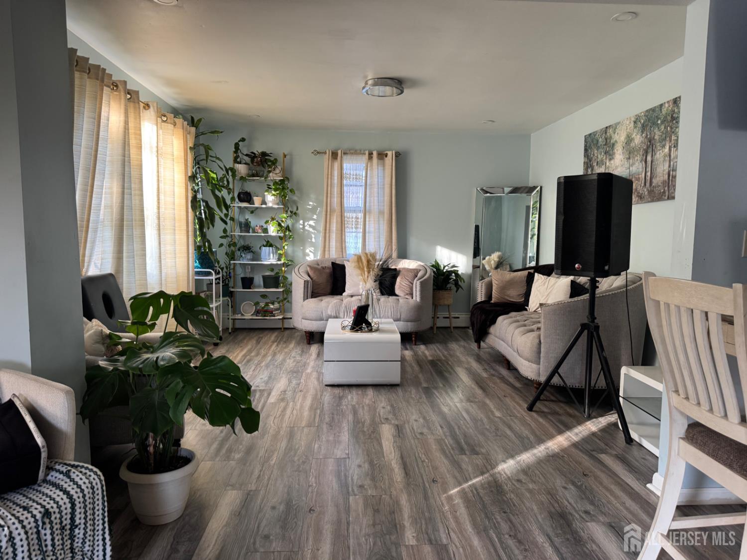 3350 Washington Road Parlin, NJ 08859 - Photo 10 of 18 a living room with furniture and a flat screen tv
