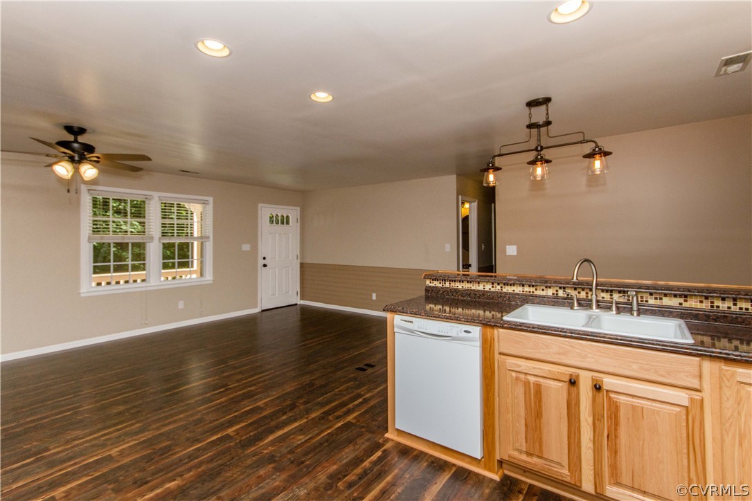 15514 Nash Road Dewitt, VA 23840 - Photo 6 of 23 a kitchen with a sink cabinets and wooden floor