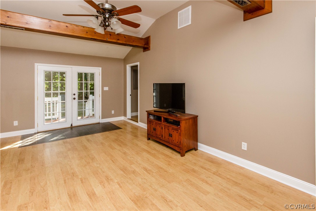 15514 Nash Road Dewitt, VA 23840 - Photo 8 of 23 a bedroom with a bed and a flat screen tv