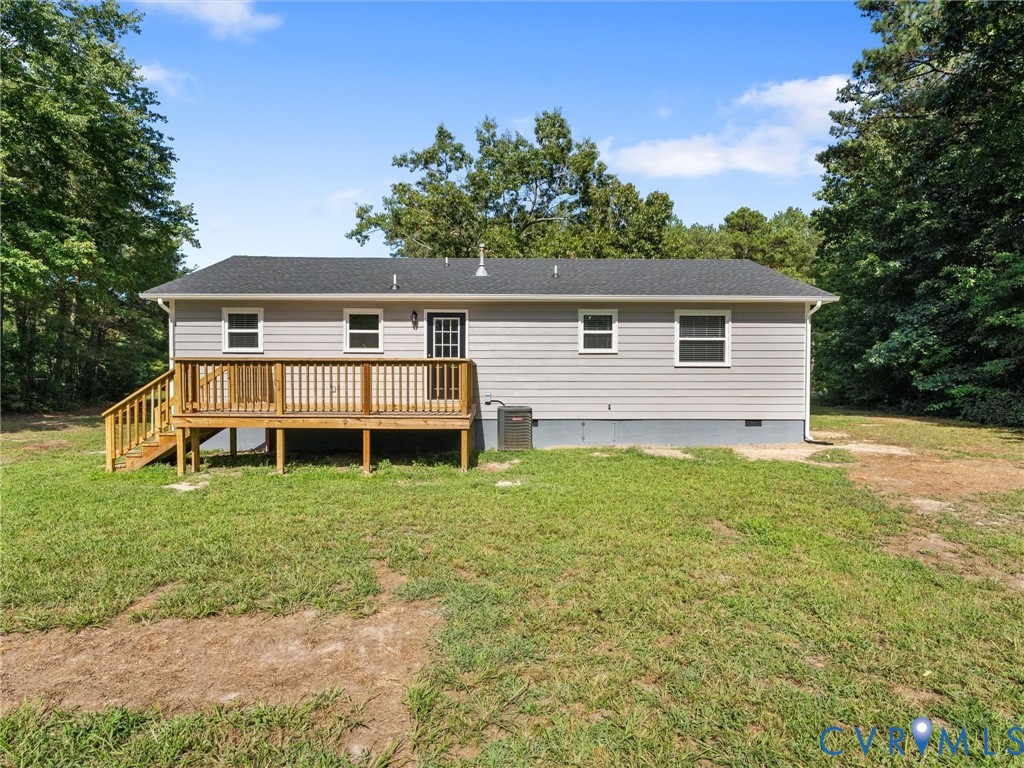 6927 Carsley Road Waverly, VA 23890 - Photo 38 of 51 Rear exterior featuring light gray siding, a dark