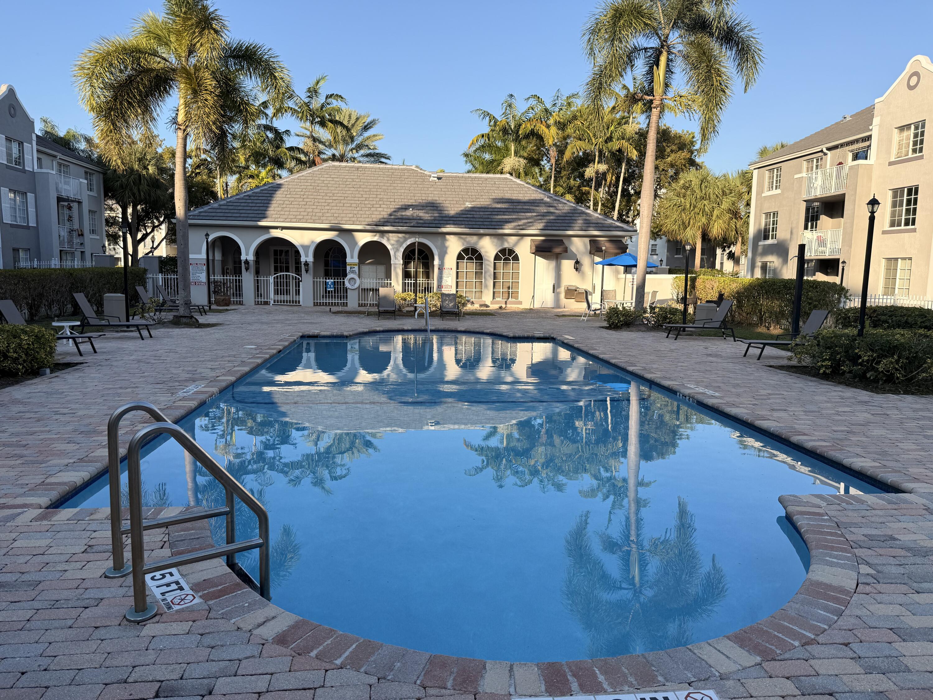 a view of a house with a swimming pool