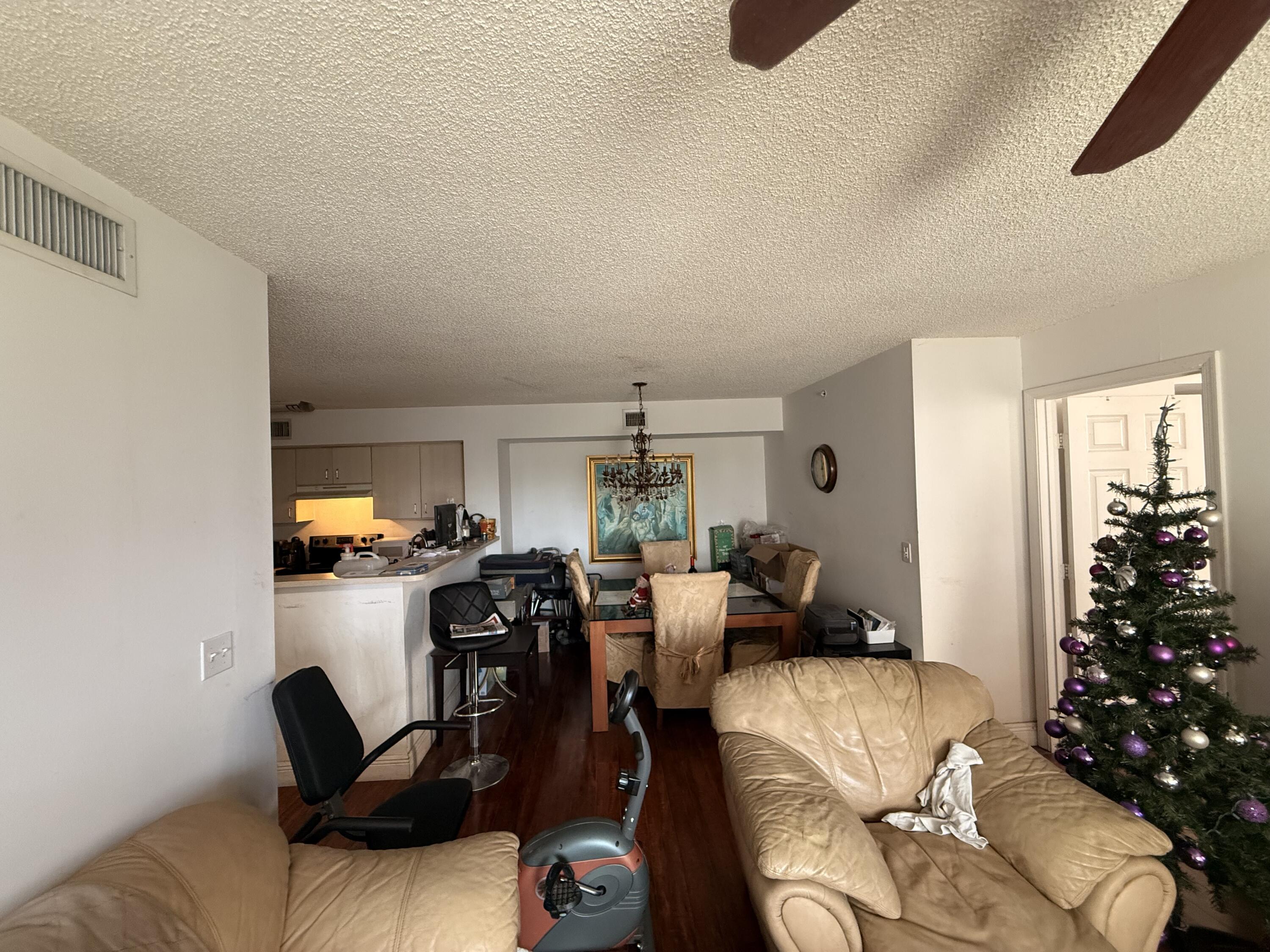 520 Southwest 111th Avenue, Unit 202 Pembroke Pines, FL 33025 - Photo 8 of 20 a view of a livingroom with furniture window and wooden floor
