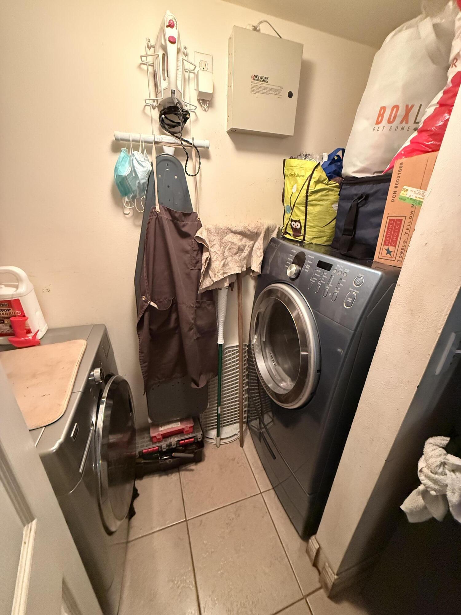 520 Southwest 111th Avenue, Unit 202 Pembroke Pines, FL 33025 - Photo 9 of 20 a utility room with dryer and washer