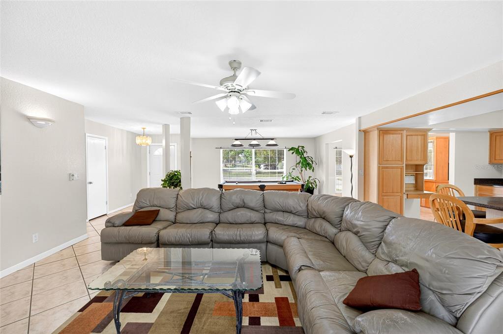 1409 Bryan Road Brandon, FL 33511 - Photo 17 of 73 a living room with furniture and a large window
