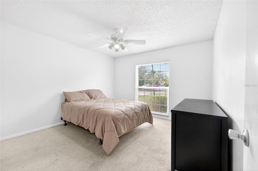 1409 Bryan Road Brandon, FL 33511 - Photo 21 of 73 a bedroom with a bed and a window