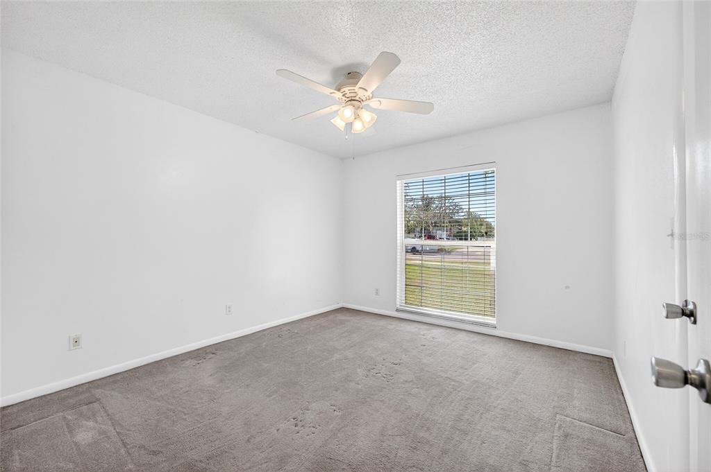1409 Bryan Road Brandon, FL 33511 - Photo 23 of 73 a view of an empty room with a window