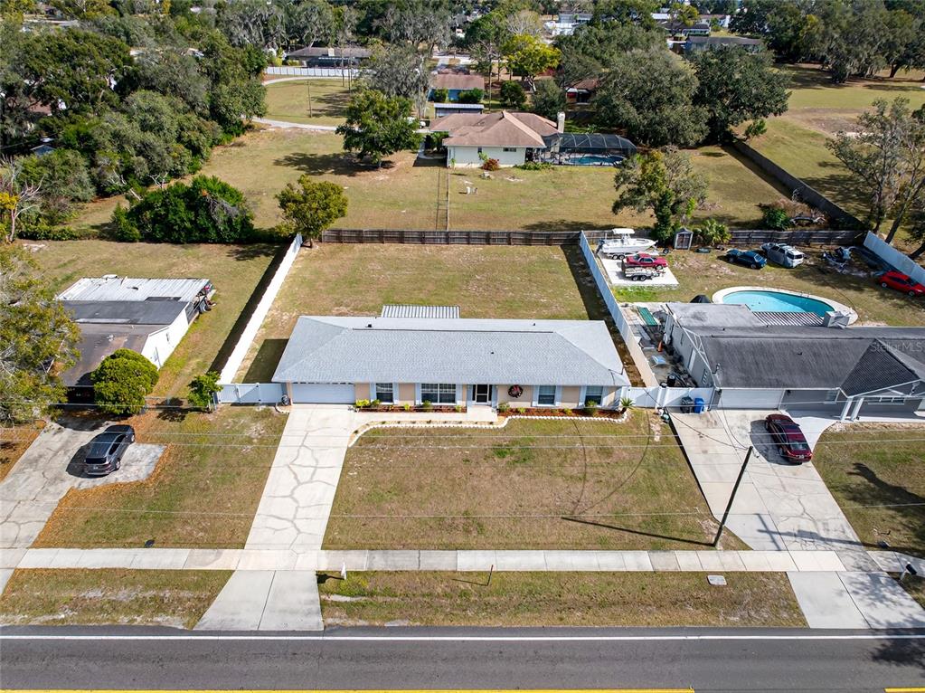 1409 Bryan Road Brandon, FL 33511 - Photo 51 of 73 an aerial view of residential houses with outdoor space