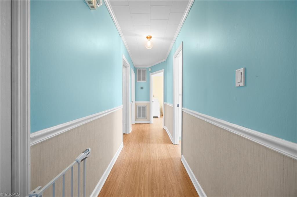 289 Vfw Road Reidsville, NC 27320 - Photo 14 of 45 Hallway to the bedrooms.