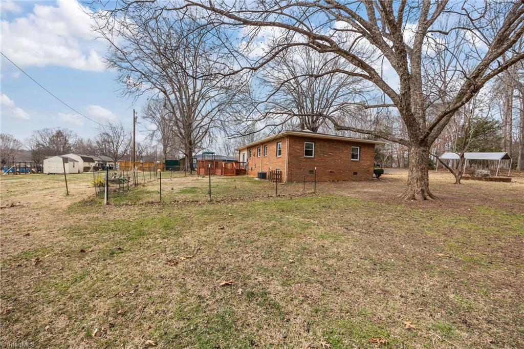 289 Vfw Road Reidsville, NC 27320 - Photo 33 of 45 Another angle showing the backyard and fruit trees.