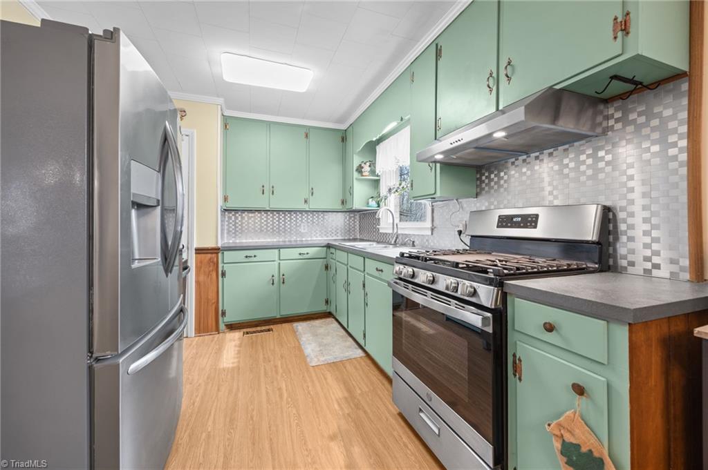 Kitchen with lots of cabinet storages.