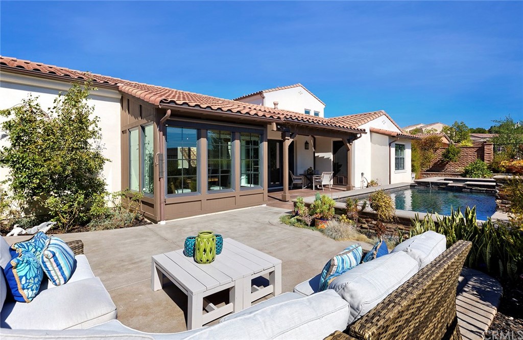 5 Cowboy Road Ladera Ranch, CA 92694 - Photo 1 of 1 a view of a patio with couches table and chairs with potted plants