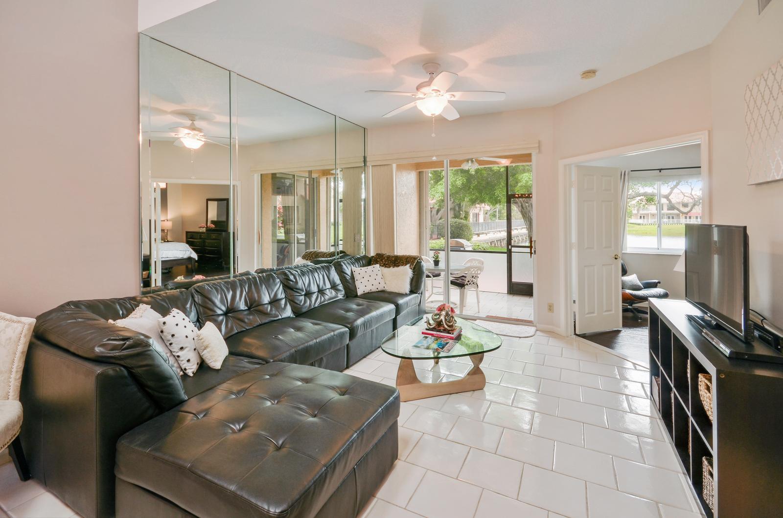 23060 Aqua View, Unit 4 Boca Raton, FL 33433 - Photo 5 of 25 living room 2