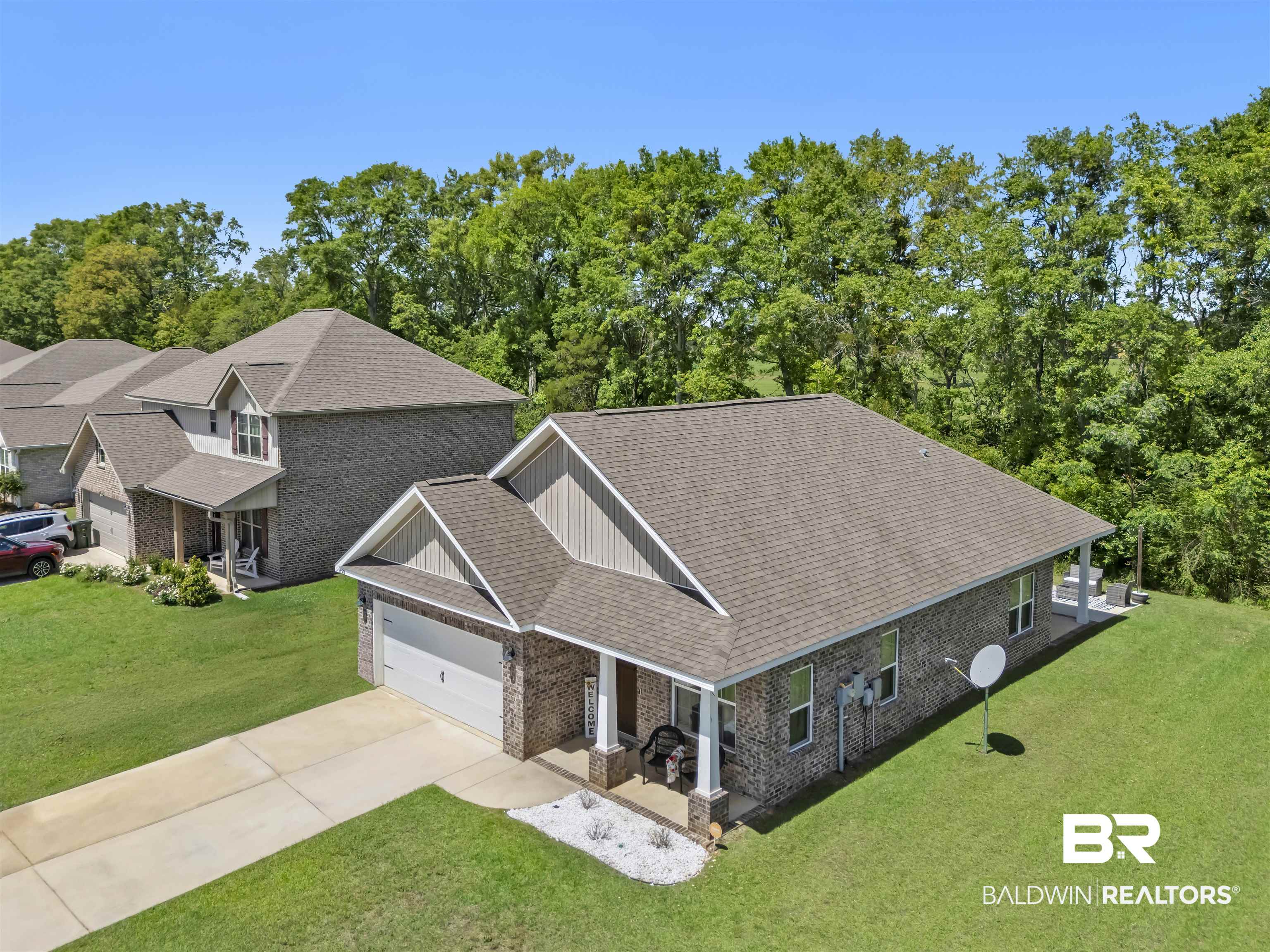 16504 Prado Loop Loxley, AL 36551 - Photo 4 of 45 Drone / aerial view of a tree filled landscape
