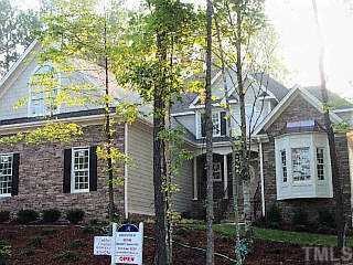 7104 Millstone Ridge Court Raleigh, NC 27614 - Photo 1 of 1 front view of a house with a small yard