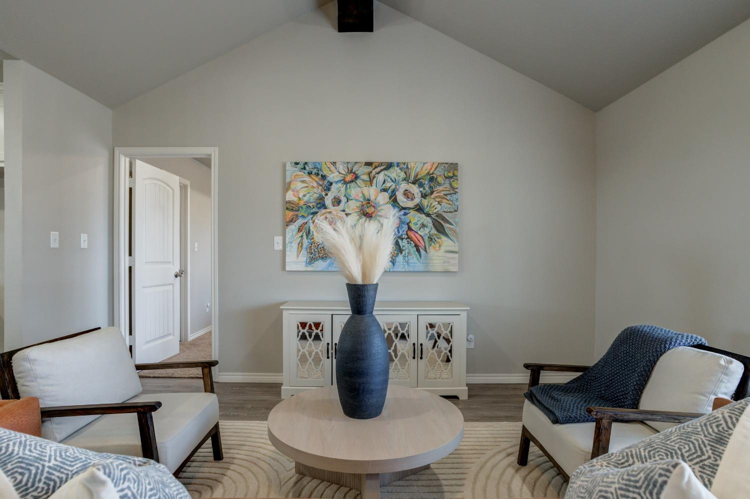 9013 County Road 6100 Shallowater, TX 79363 - Photo 12 of 49 a living room with furniture and a chair