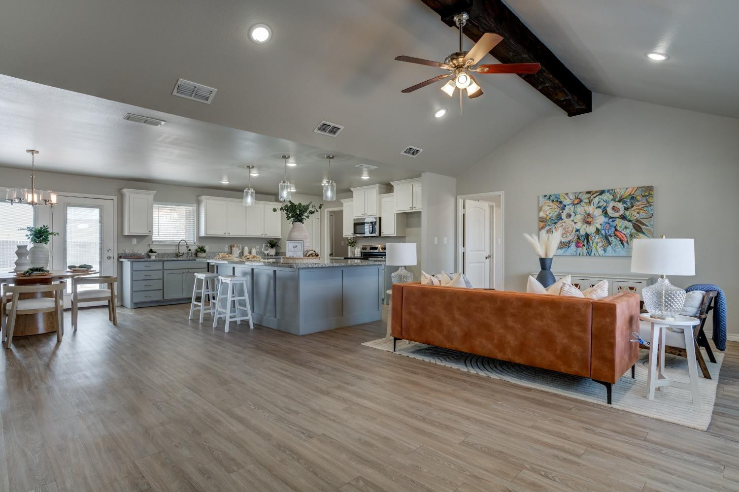 9013 County Road 6100 Shallowater, TX 79363 - Photo 14 of 49 a living room with furniture and kitchen view